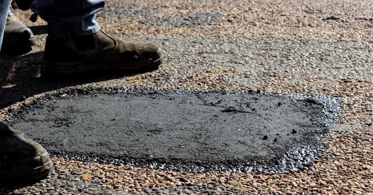 Two possible itineraries on the Silk Road [closed] - Person in Brown Leather Boots Standing on Gray Concrete Floor