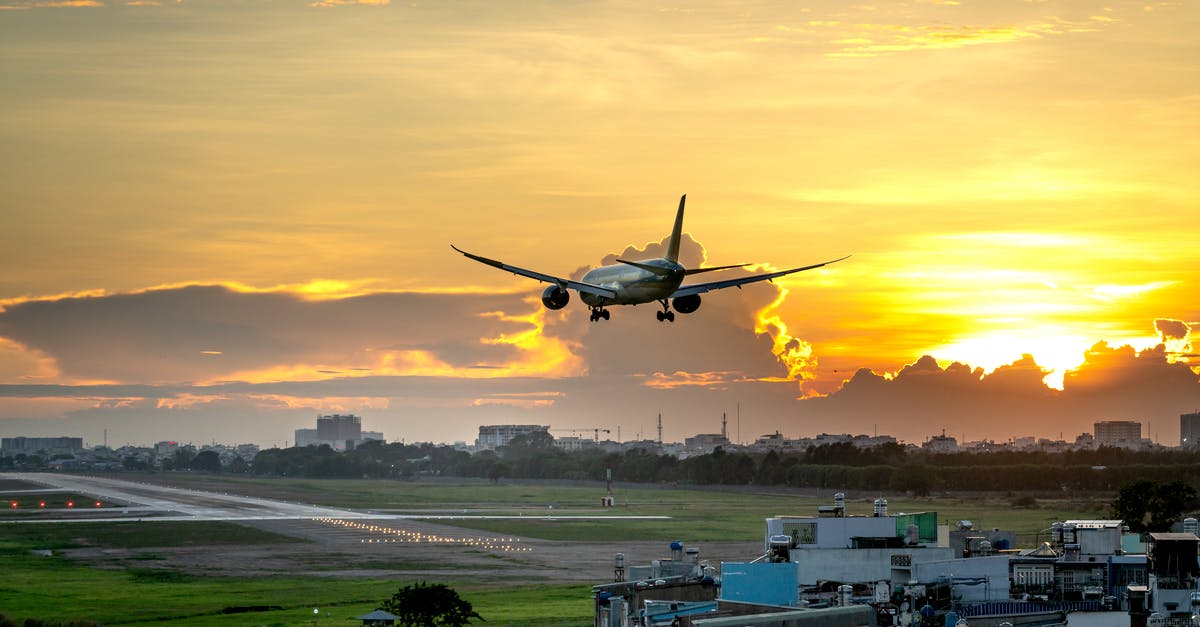Uk airport visa multiple entry? - White Passenger Plane on Air during Sunset Uk airport visa multiple entry? - White Passenger Plane on Air during Sunset
