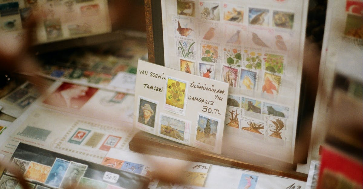 UK Entry Stamp - different from a visa? - Showcase with assorted postage stamps with illustrations of birds and artworks for sale in shop UK Entry Stamp - different from a visa? - Showcase with assorted postage stamps with illustrations of birds and artworks for sale in shop