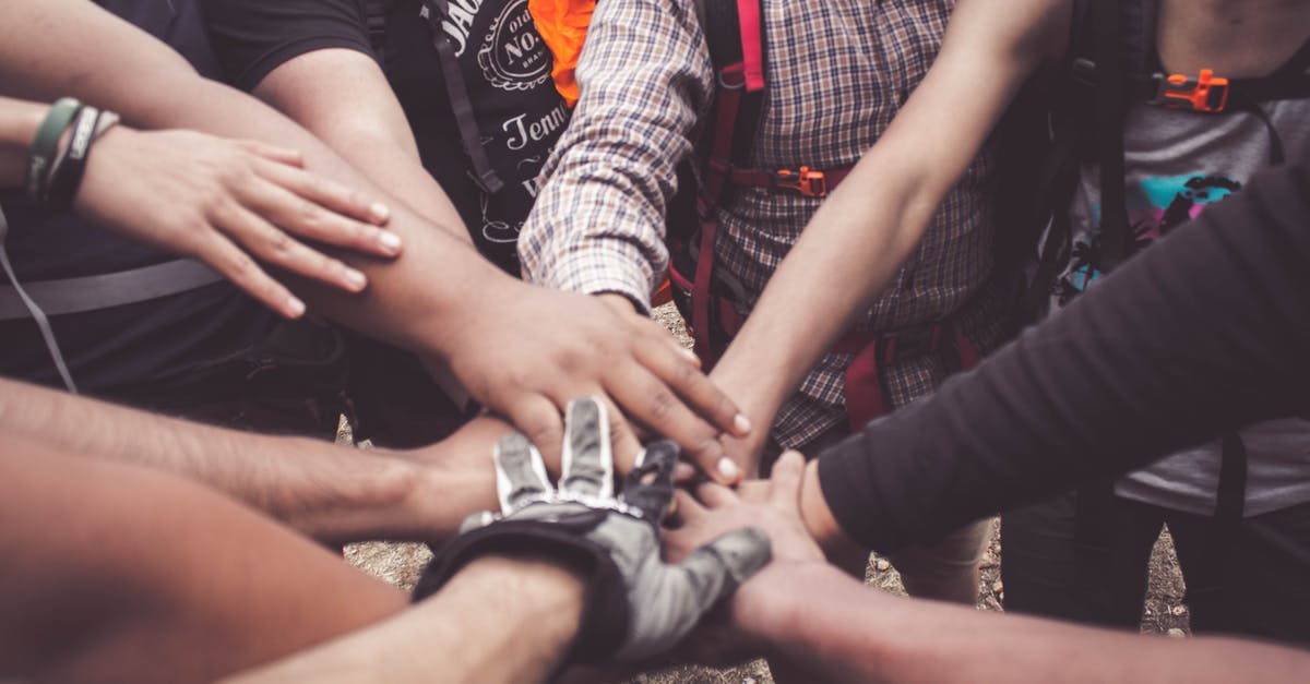 UK Family Permit Application and Supporting Documents - People Doing Group Hand Cheer UK Family Permit Application and Supporting Documents - People Doing Group Hand Cheer