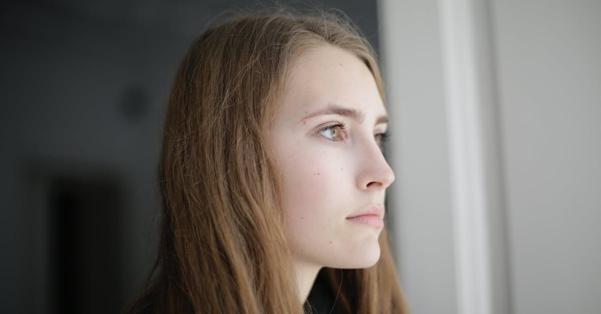 UK Family Visa Refused, how long till I reapply? - Pensive young woman in living room UK Family Visa Refused, how long till I reapply? - Pensive young woman in living room