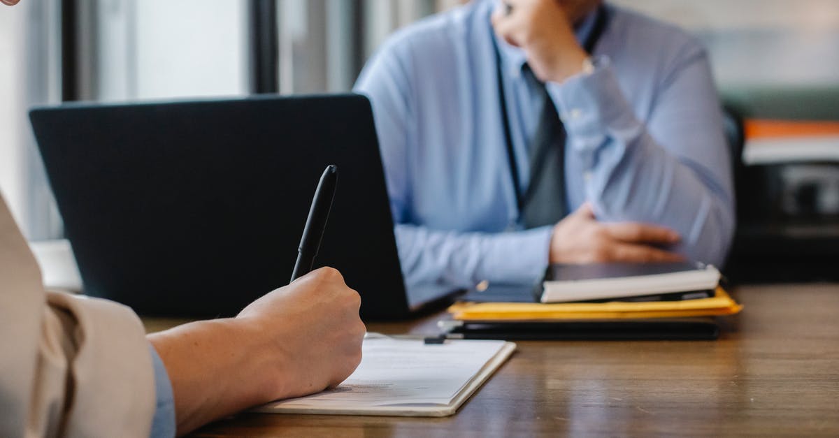 UK Immigration officers arrivals interview questions - Crop anonymous female filling questionnaire when applying for job sitting in employer office UK Immigration officers arrivals interview questions - Crop anonymous female filling questionnaire when applying for job sitting in employer office