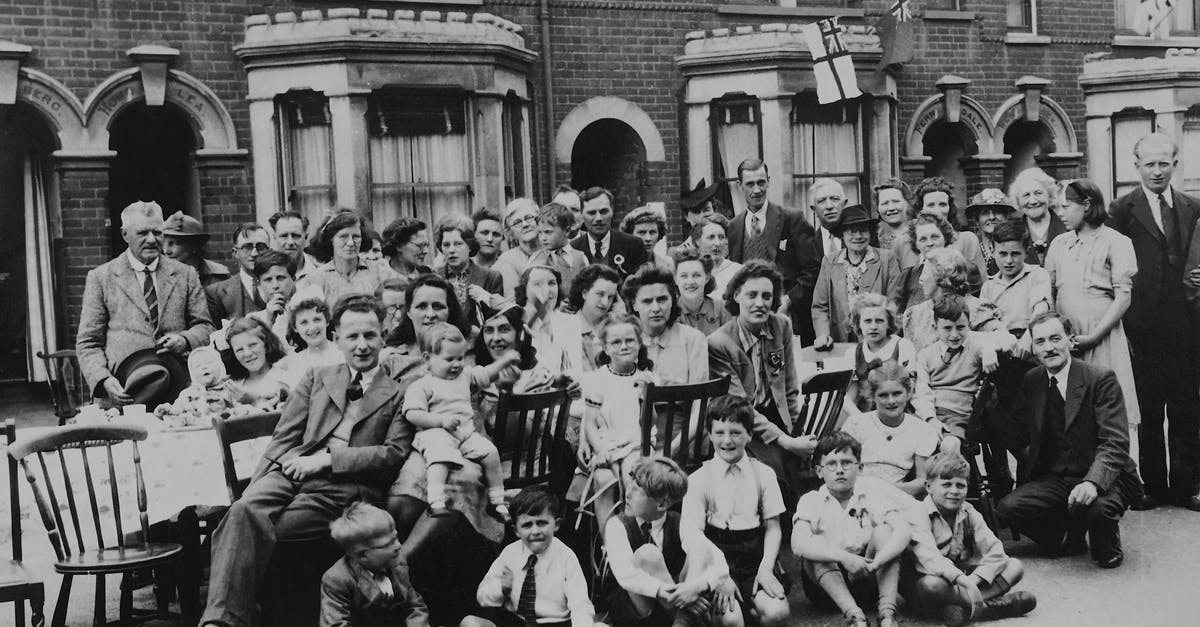 UK standard visitor visa for family visit - A Grayscale Photo of People on the Street UK standard visitor visa for family visit - A Grayscale Photo of People on the Street