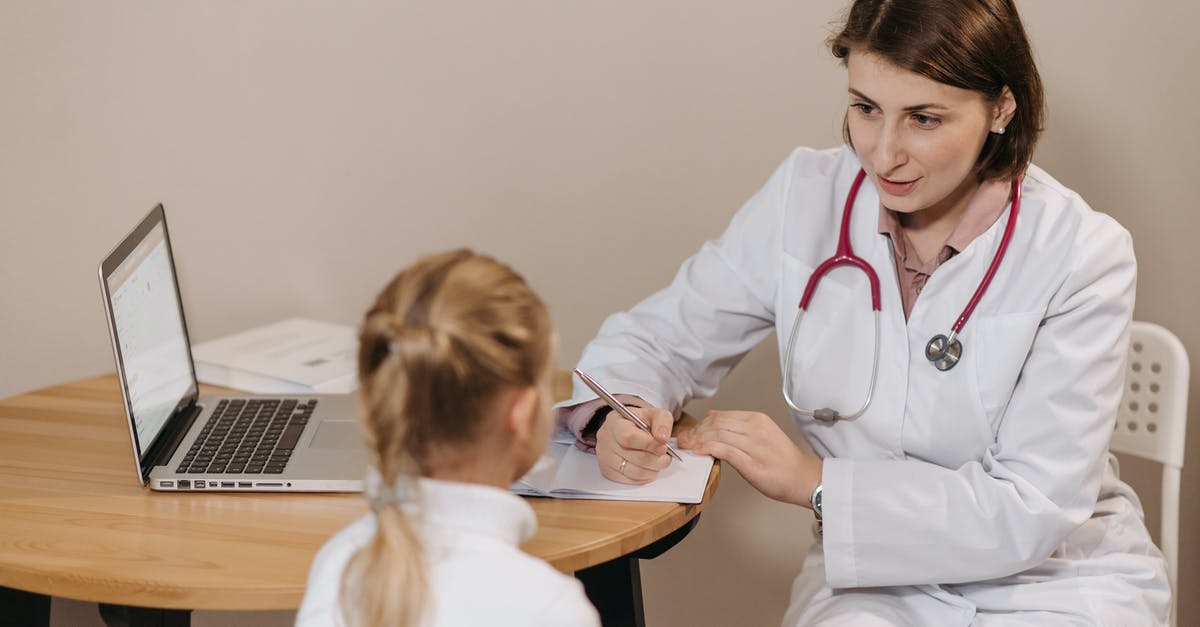 UK Standard Vistor Visa Clarifications - Filling form for my wife and two children - Woman in White Lab Coat Listening to a Girl and Writing Down Notes