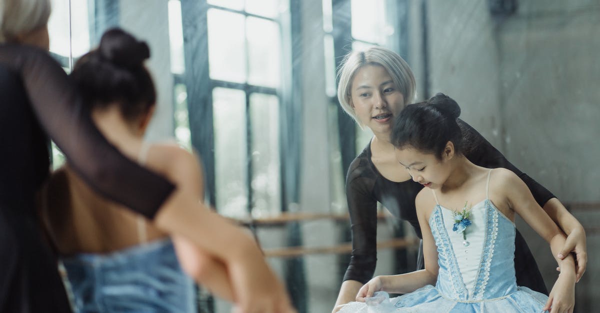 UK train with declassified first class coach due to overcrowding - any recourse for 1st class ticket holders? - Professional ethnic ballerina teaching pupil ballet in dance room of school while looking at reflection in mirror