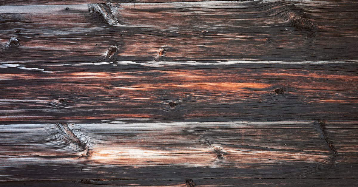 UK trains: I bought a return ticket from London Euston to Coventry. Can I board at different station? - Top view of wooden surface consisting of boards with different ornament and spots and colors arranged near to each other