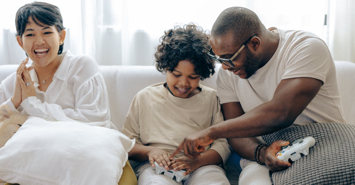 UK visa application: How to explain that I have several employers? - Caring father teaching son using joystick UK visa application: How to explain that I have several employers? - Caring father teaching son using joystick