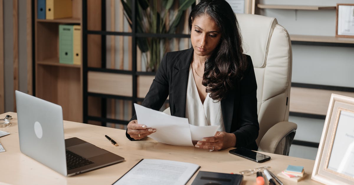 UK Visa for Indian National: Translation Requirements for Employment Contract and Salary Slips - Woman Working at the Desk in Office