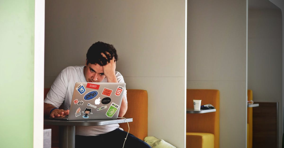 UK visa for unemployed person - Man in White Shirt Using Macbook Pro UK visa for unemployed person - Man in White Shirt Using Macbook Pro