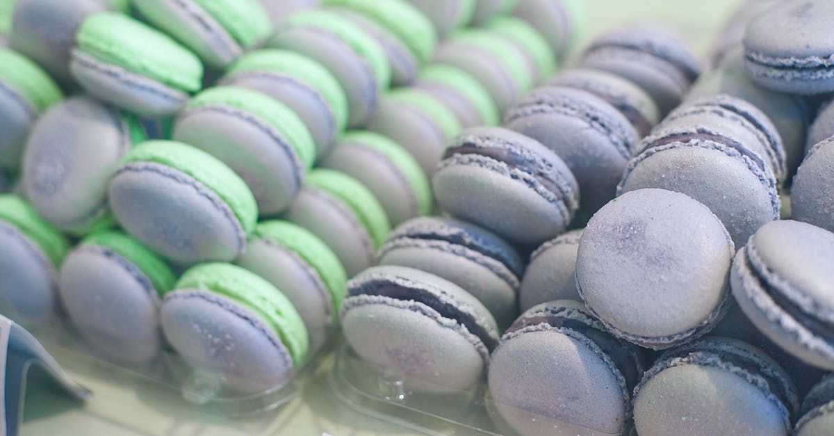 UK Visa form filling - From above of assorted tasty meringue biscuits with bright filling between crunchy baked round shaped layers UK Visa form filling - From above of assorted tasty meringue biscuits with bright filling between crunchy baked round shaped layers