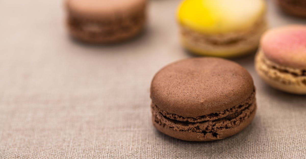 UK Visa form filling - Collection of tasty baked meringue biscuits with smooth fillings between crunchy layers on blurred background UK Visa form filling - Collection of tasty baked meringue biscuits with smooth fillings between crunchy layers on blurred background