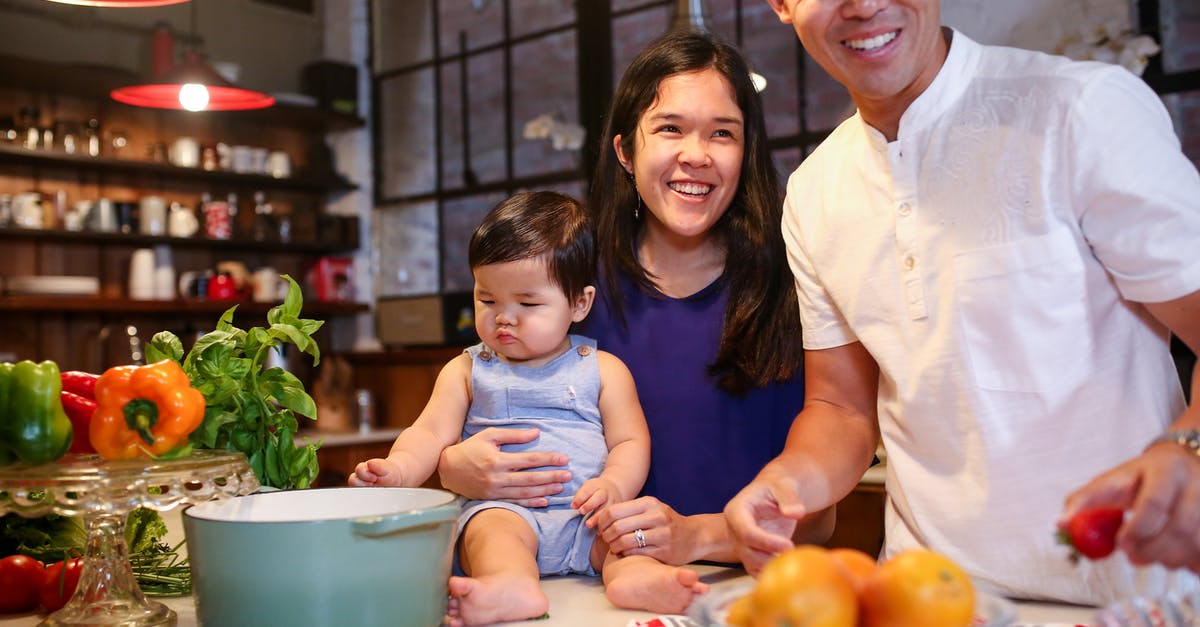 UK visa issued for parents, but refused for baby - Man in White Dress Shirt Beside Woman in Blue Tank Top UK visa issued for parents, but refused for baby - Man in White Dress Shirt Beside Woman in Blue Tank Top