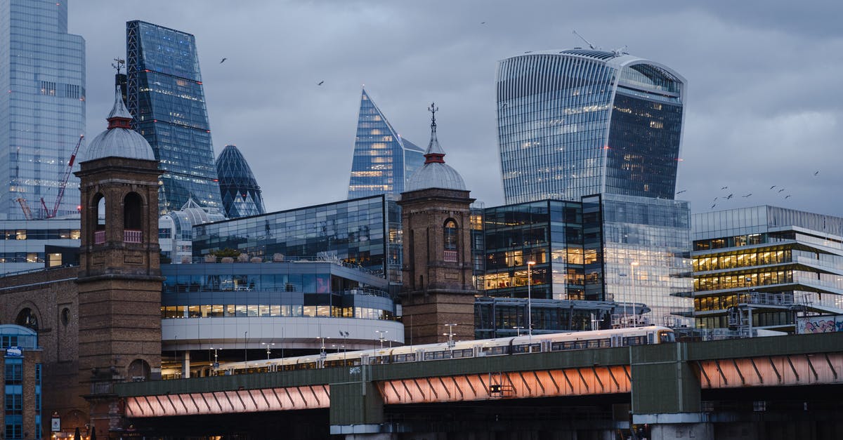 UK visit visa refused due to unexplained deposits, how to address. complex statement - Modern skyscrapers near bridge in London UK visit visa refused due to unexplained deposits, how to address. complex statement - Modern skyscrapers near bridge in London