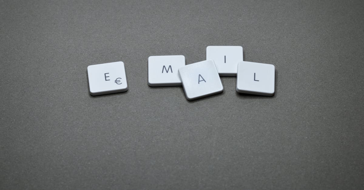 UK Visitor Visa Email [closed] - Email Blocks on Gray Surface