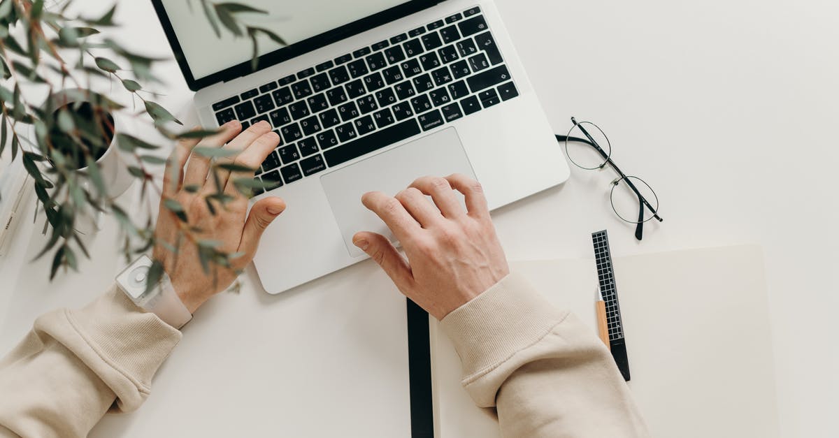 UK visitor visa for a young freelancer - Person in Beige Long Sleeve Shirt Using Macbook Pro UK visitor visa for a young freelancer - Person in Beige Long Sleeve Shirt Using Macbook Pro