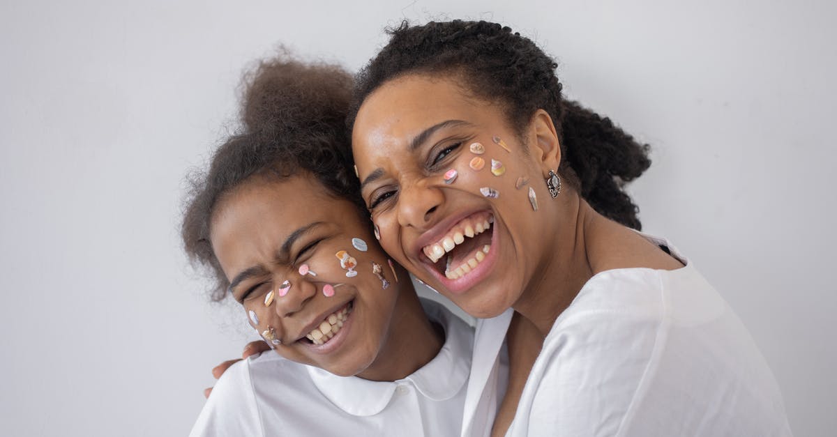 UK visitor Visa for child with mother - A Girl and a Woman With Face Stickers Smiling UK visitor Visa for child with mother - A Girl and a Woman With Face Stickers Smiling