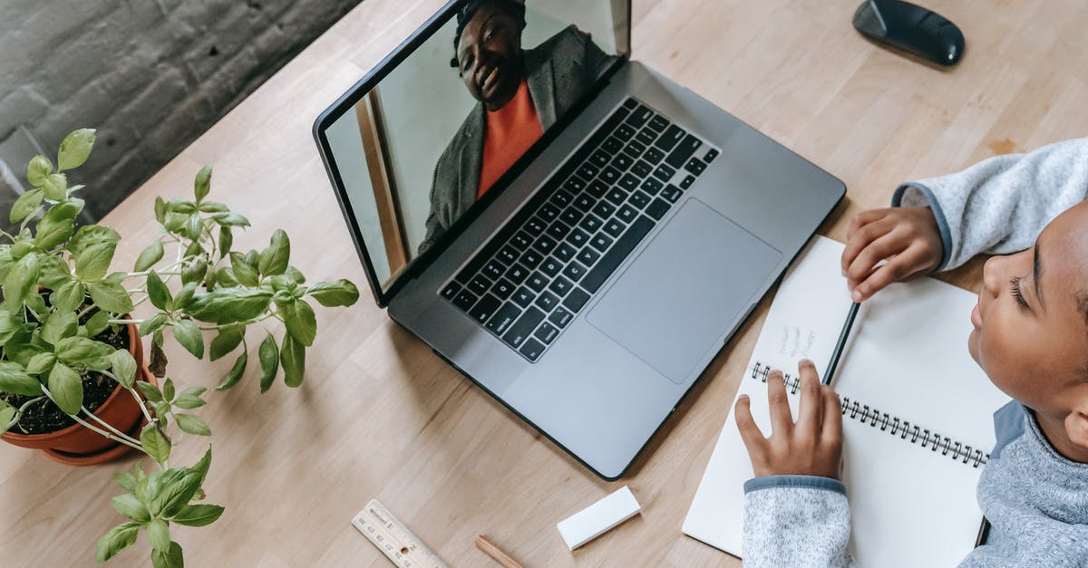 UK Visitor Visa for PLAB exam expiring and exams cancelled due to COVID [closed] - Top view of adorable intelligent African American boy preparing for exam with tutor through internet on latop