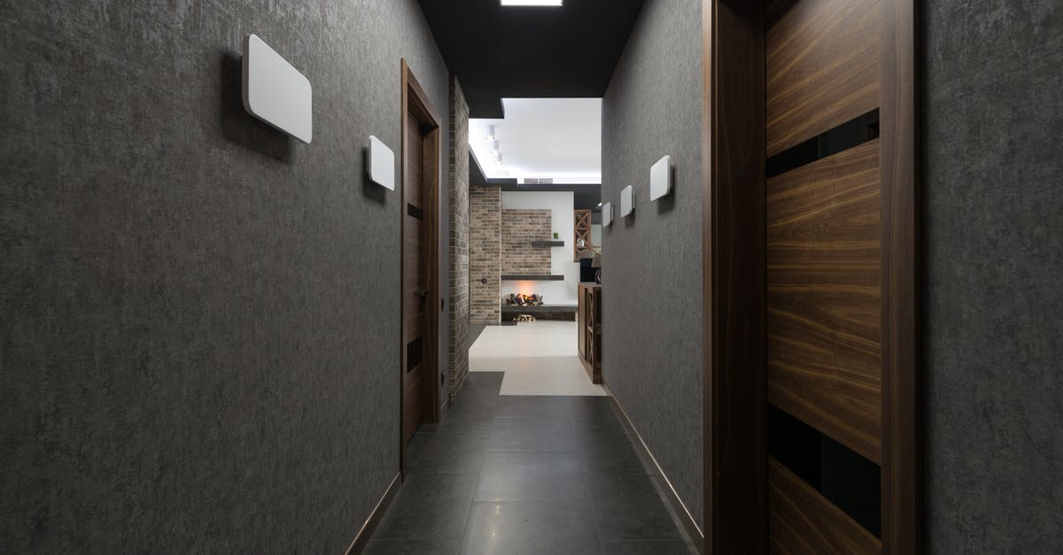 UK visitor visa reconsidering after Pap how long new decision will take? - Long corridor with gray walls and wooden doors leading to light living room with decorations at home with stylish design UK visitor visa reconsidering after Pap how long new decision will take? - Long corridor with gray walls and wooden doors leading to light living room with decorations at home with stylish design