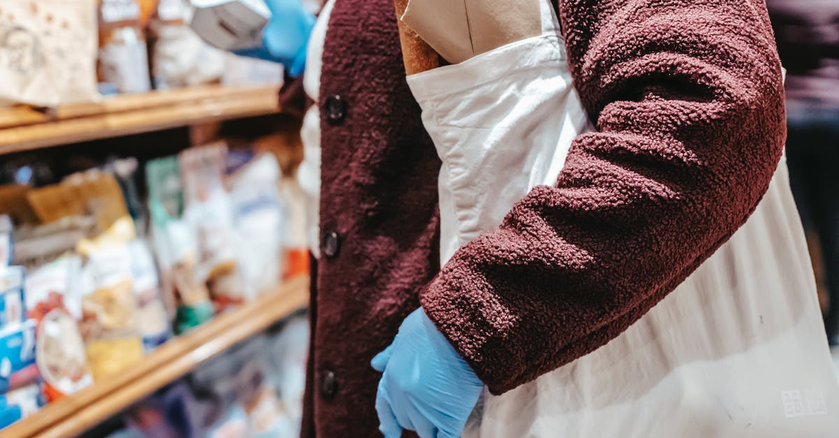 UKVI ECO made a mistake on my visa decision - Woman with shopping bag choosing food in supermarket UKVI ECO made a mistake on my visa decision - Woman with shopping bag choosing food in supermarket