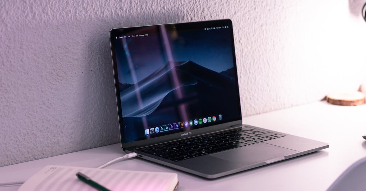 Unable to charge HP NoteBook 840 G4 laptop while being overseas - Modern laptop near pen on notepad on desk Unable to charge HP NoteBook 840 G4 laptop while being overseas - Modern laptop near pen on notepad on desk