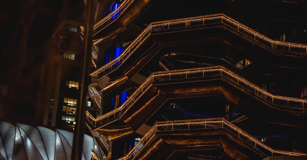 Under 18 years applying for B2 visa to USA - Modern building with illuminated lights at night Under 18 years applying for B2 visa to USA - Modern building with illuminated lights at night