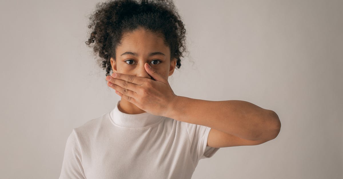 Unsure about ability to provide a full list of past emails+phone numbers. Is this a problem for visiting the US? - Concerned African American teenage girl in white outfit looking at camera while covering mouth with hand on gray background in studio Unsure about ability to provide a full list of past emails+phone numbers. Is this a problem for visiting the US? - Concerned African American teenage girl in white outfit looking at camera while covering mouth with hand on gray background in studio