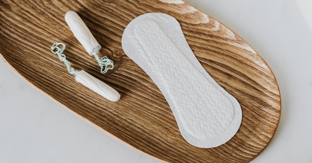 Unused b1/b2 valid visa - Products of personal hygiene for women on wooden stand Unused b1/b2 valid visa - Products of personal hygiene for women on wooden stand