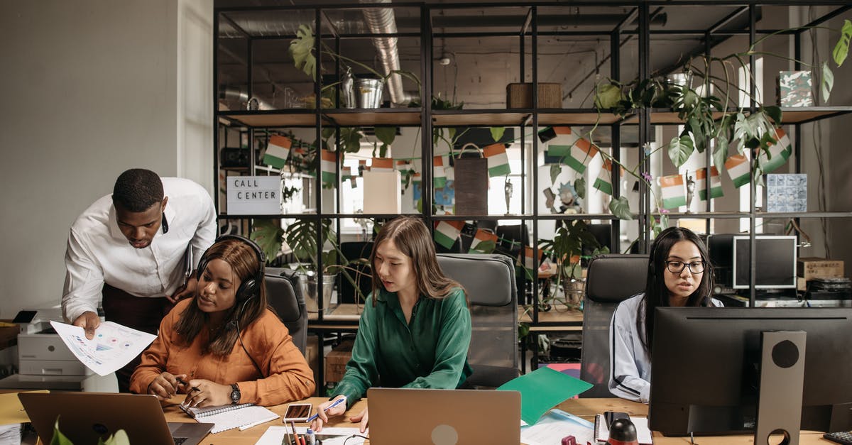 Unused Business visa - Man in Black Jacket Sitting Beside Woman in Brown Jacket Unused Business visa - Man in Black Jacket Sitting Beside Woman in Brown Jacket