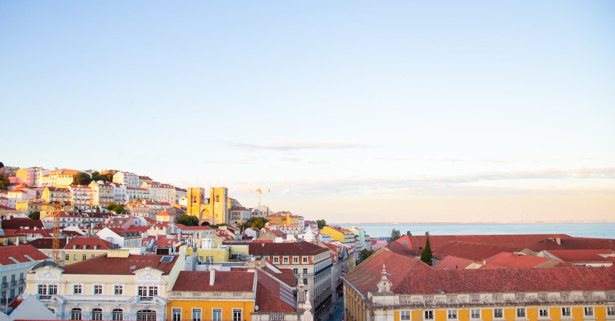 Urban exploration in Lisbon area, Portugal - Lisbon residential district roofs in twilight Urban exploration in Lisbon area, Portugal - Lisbon residential district roofs in twilight