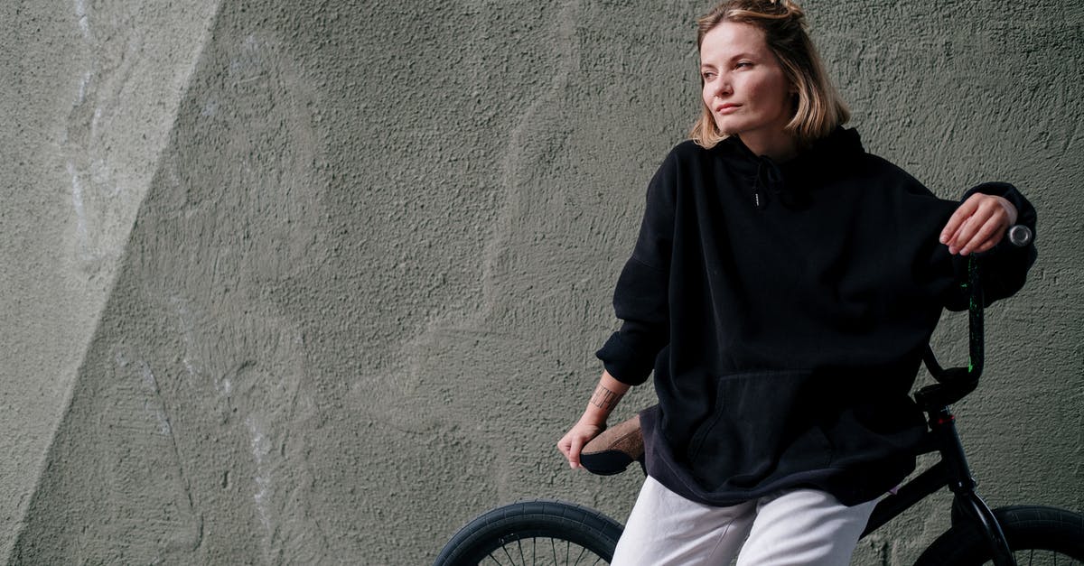 US based flights bicycle question - Girl in Black Hoodie and White Pants Riding Bicycle US based flights bicycle question - Girl in Black Hoodie and White Pants Riding Bicycle