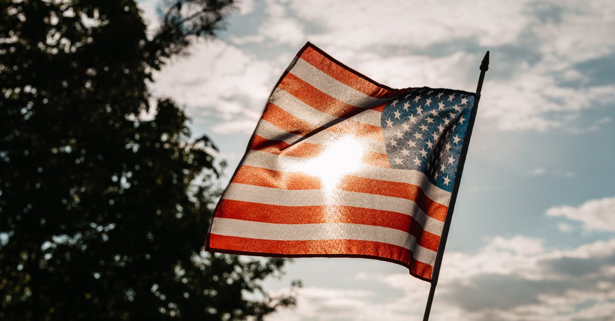 US Declaration Cards given out even though they were unnecessary - American Flag Under A Cloudy Sky US Declaration Cards given out even though they were unnecessary - American Flag Under A Cloudy Sky