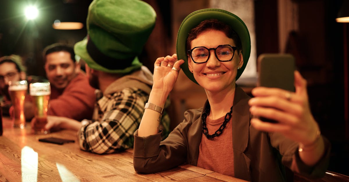 Using my Azerbaijan driver's license in the Netherlands? - Woman in Brown Long Sleeve Shirt Wearing Green Hat Using my Azerbaijan driver's license in the Netherlands? - Woman in Brown Long Sleeve Shirt Wearing Green Hat
