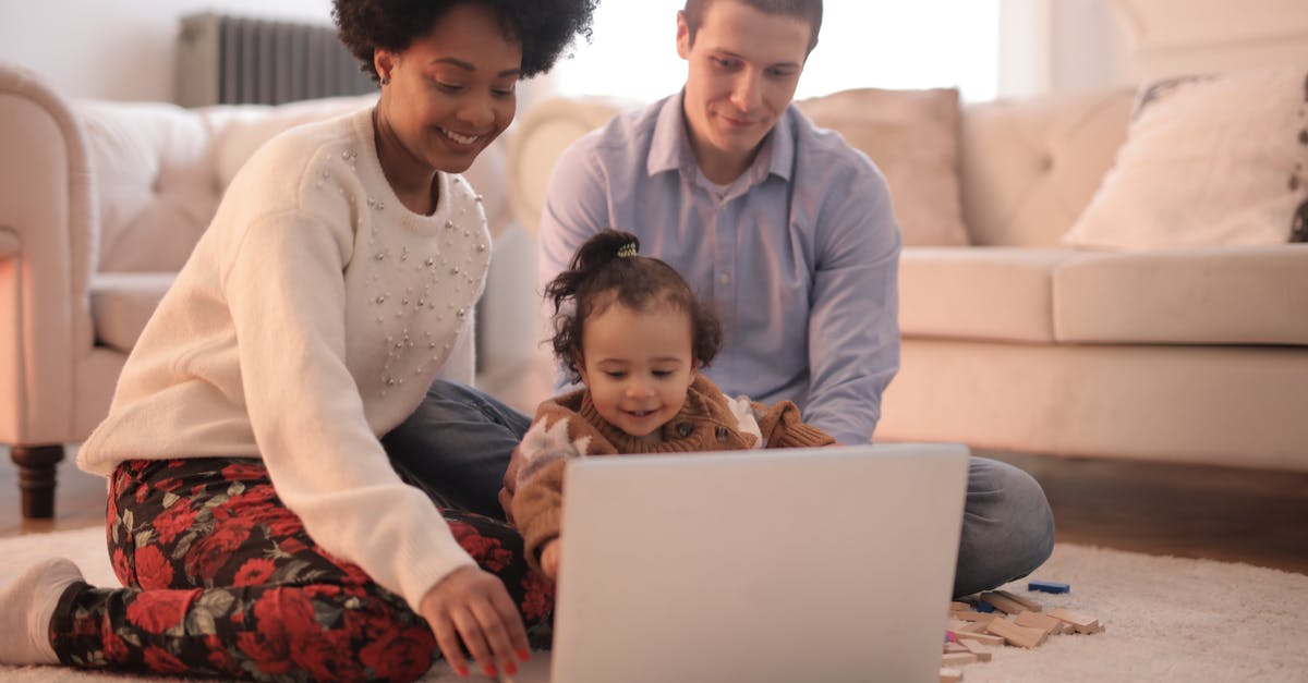 Using no-show ticket for infant - Photo of Family Sitting on Floor While Using Laptop Using no-show ticket for infant - Photo of Family Sitting on Floor While Using Laptop