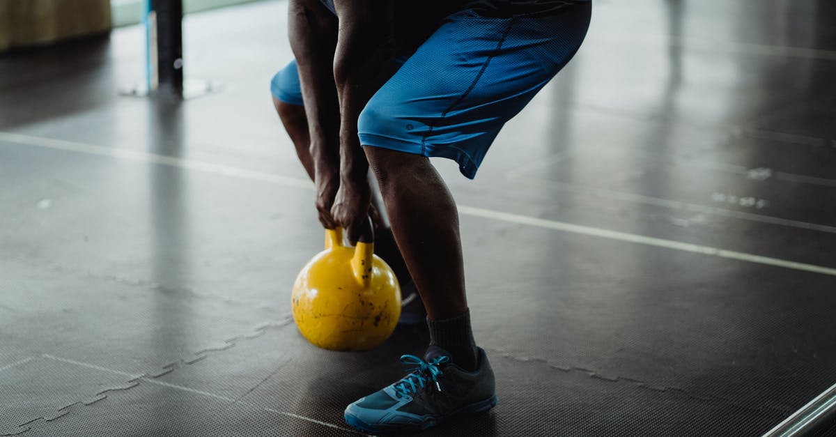 Using squat toilets with arthritic knees - Person Using Yellow Kettlebell Using squat toilets with arthritic knees - Person Using Yellow Kettlebell