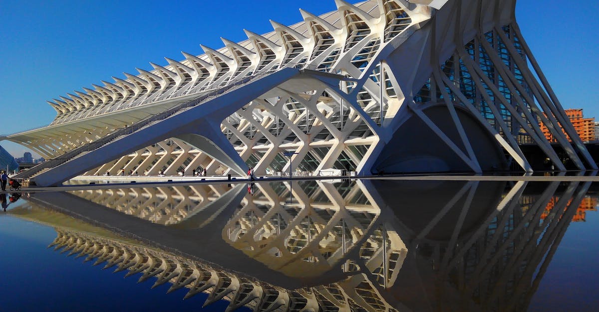 Valencia Floods - Should I cancel my trip? - White Concrete Structure Beside Body of Water Valencia Floods - Should I cancel my trip? - White Concrete Structure Beside Body of Water
