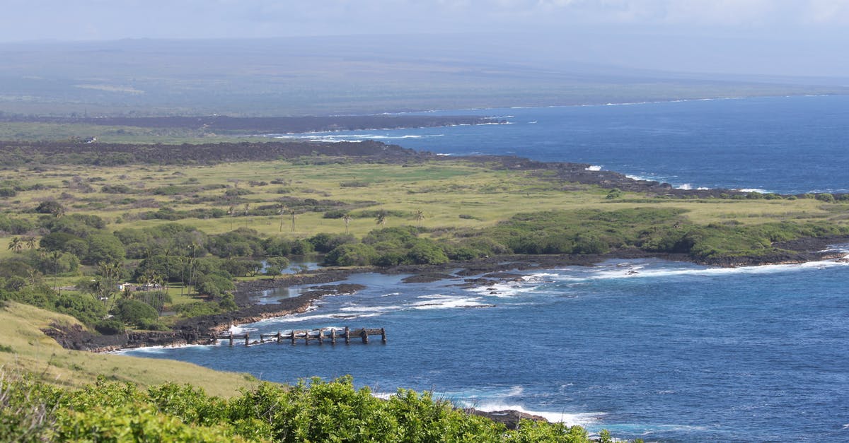 Valid US visa on expired passport. Can I travel to the US? [duplicate] - Free stock photo of bay, beach, cliff