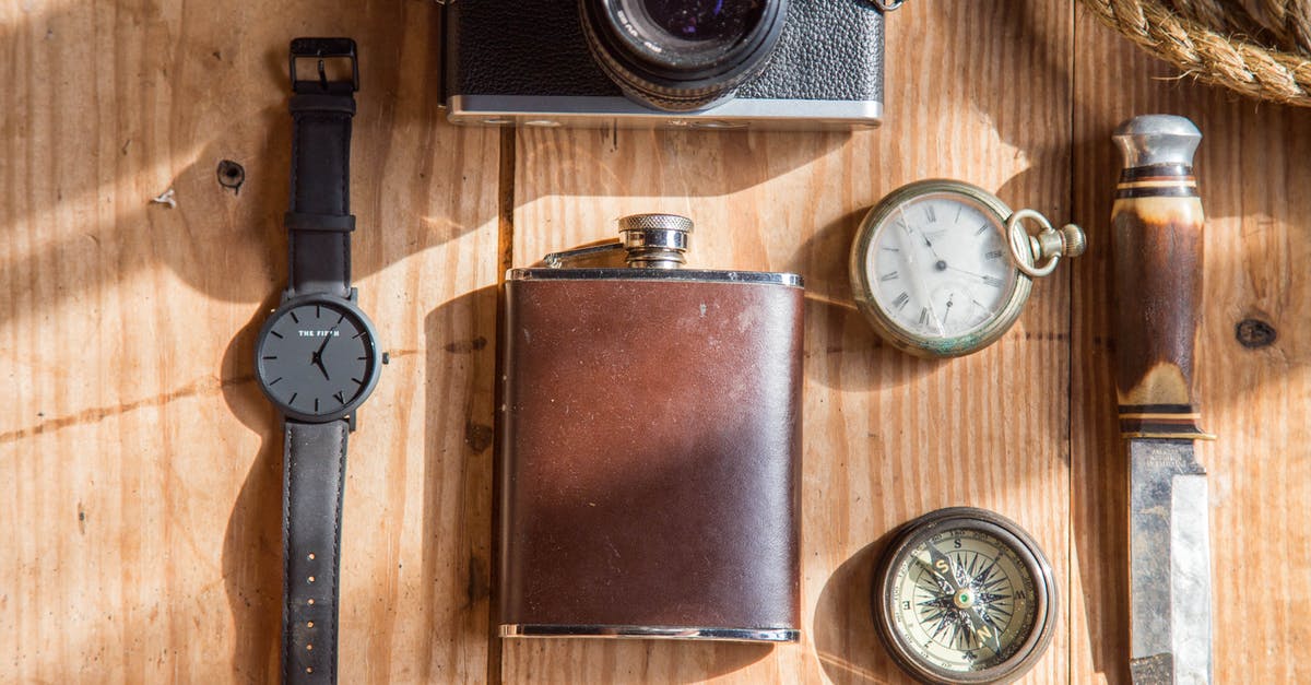 Valid visa on old passport, one time going to Canada - Brown Wine Flask Near Lomo Camera Watch Knife and Pocket Watches on Able Valid visa on old passport, one time going to Canada - Brown Wine Flask Near Lomo Camera Watch Knife and Pocket Watches on Able