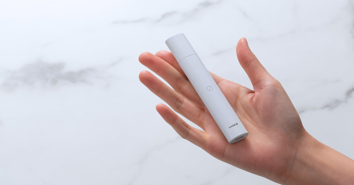 Vape cartridge scrutiny at UK customs - Person Holding White Power Bank