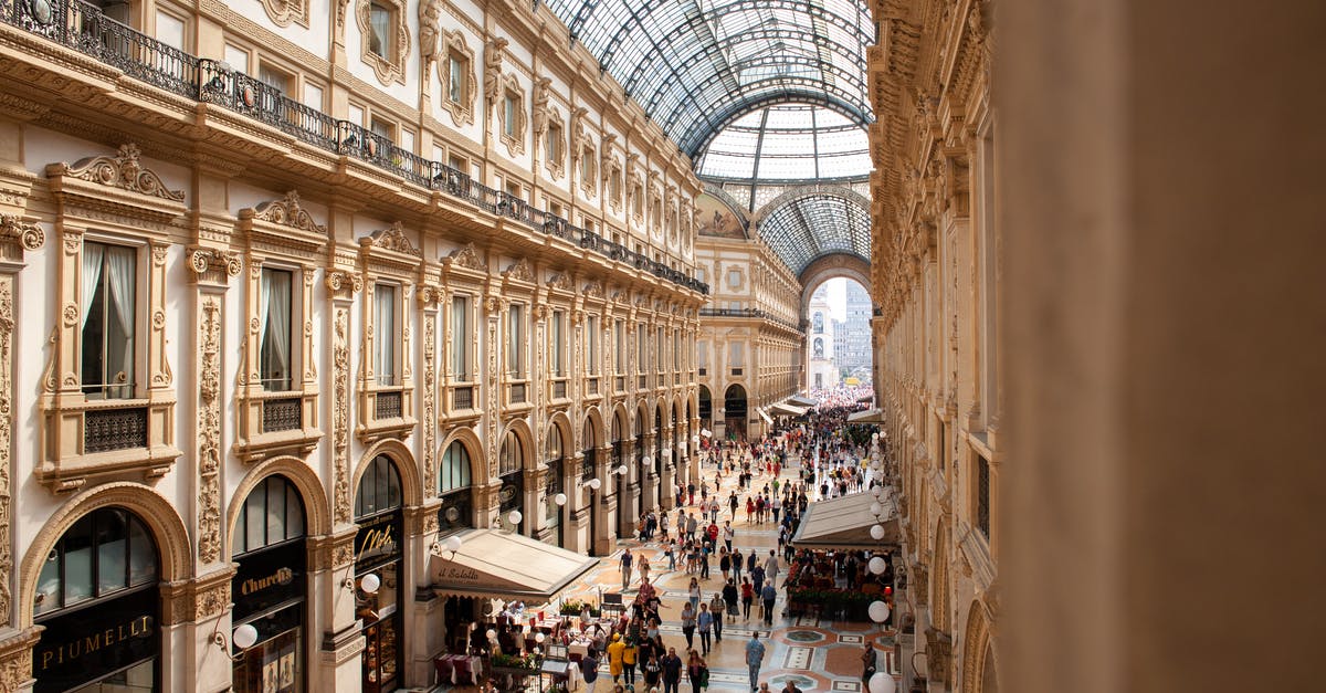 VAT Refund in Milano - People Inside Galleria Vittorio Emanuele II Shopping Mall In Italy VAT Refund in Milano - People Inside Galleria Vittorio Emanuele II Shopping Mall In Italy
