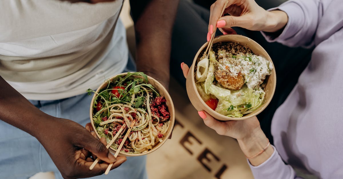 Vegetarian dishes in Cuba - Man And Woman Eating Healthy Food