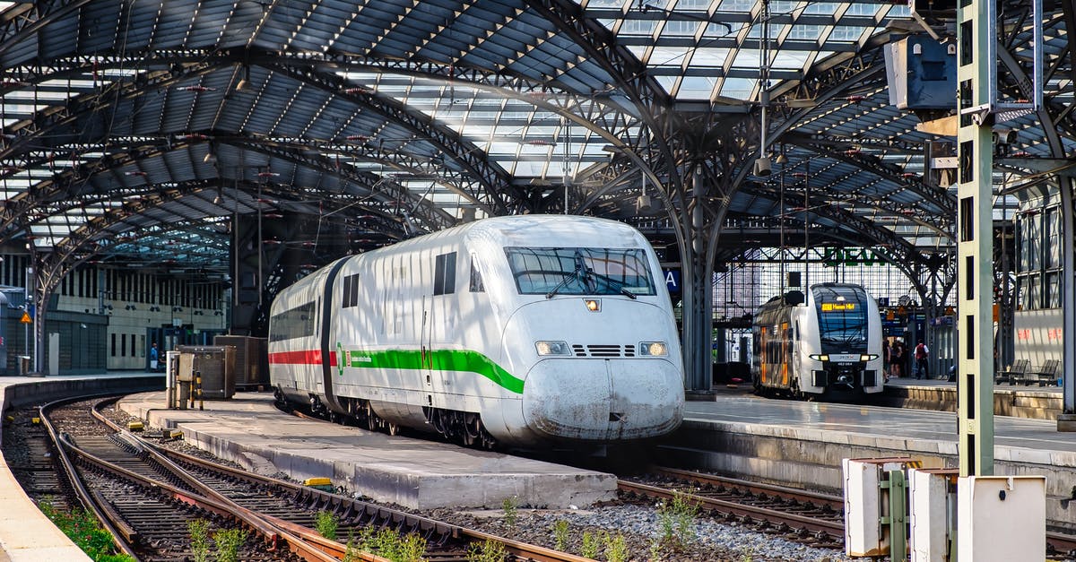 Very cheap but inaccessible UK train fares - White and Green Train on Rail Tracks Very cheap but inaccessible UK train fares - White and Green Train on Rail Tracks