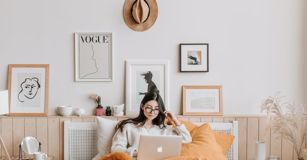 VFS not responding to email - Woman Using Laptop In Bed VFS not responding to email - Woman Using Laptop In Bed