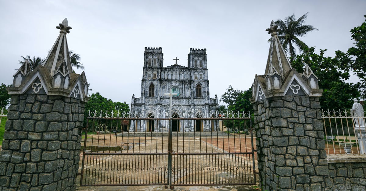 Vietnam visa for UK citizen - Grey Concrete Building Under White Sky Vietnam visa for UK citizen - Grey Concrete Building Under White Sky