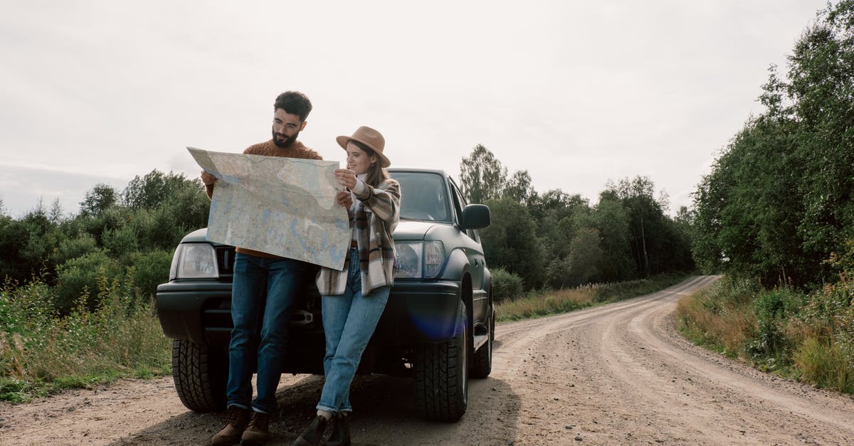 Vietnamese hat lost passing Security at DXB - 2nd March,2016 [closed] - A Couple on a Road Trip Looking at a Map 