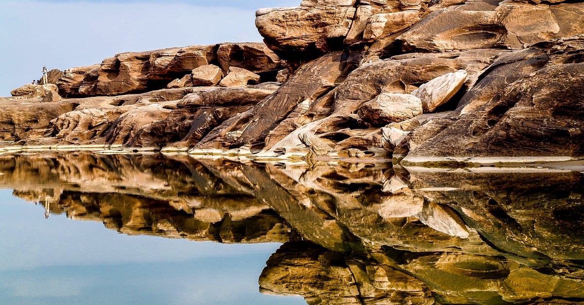 View the Grand Canyon by helicopter - is it real? - Rock Formation Mirrored by Water View the Grand Canyon by helicopter - is it real? - Rock Formation Mirrored by Water