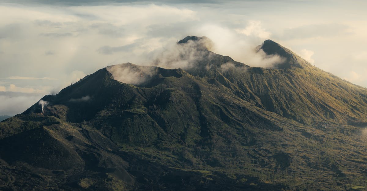 Visa and Immigration delays on arrival in Denpasar, Bali, Indonesia - Bird's Eye View Photo Of Volcano Visa and Immigration delays on arrival in Denpasar, Bali, Indonesia - Bird's Eye View Photo Of Volcano