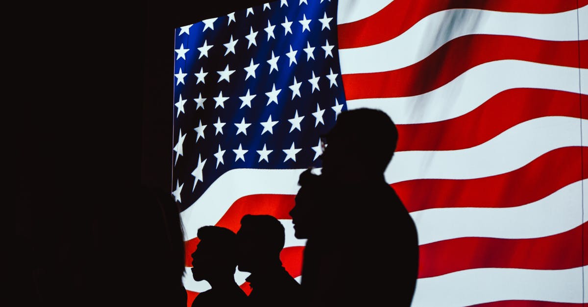 Visa annulment or revocation - spending more days in another schengen state than issuing state - Silhouette of Four Person With Flag of United States Background
