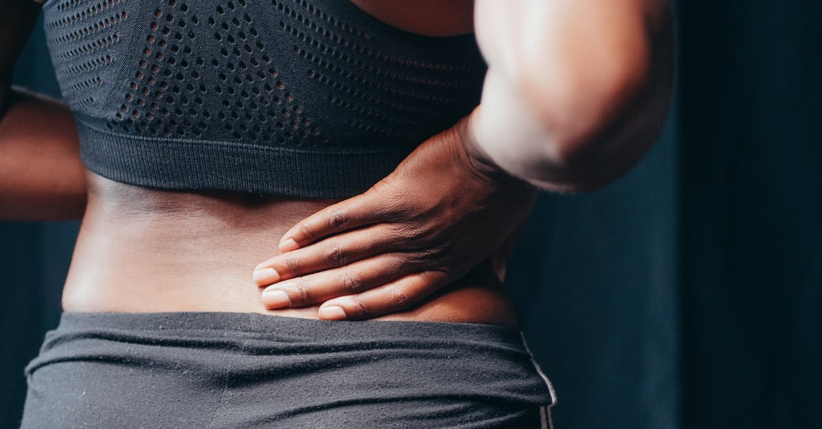 Visa extension after injury - A Person Having a Back Pain Visa extension after injury - A Person Having a Back Pain