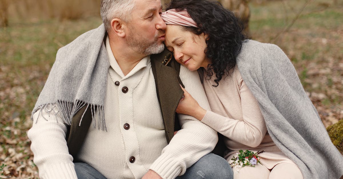 Visa for Thai wife going on holiday with British husband in Spain [duplicate] - Happy senior couple hugging in autumn park