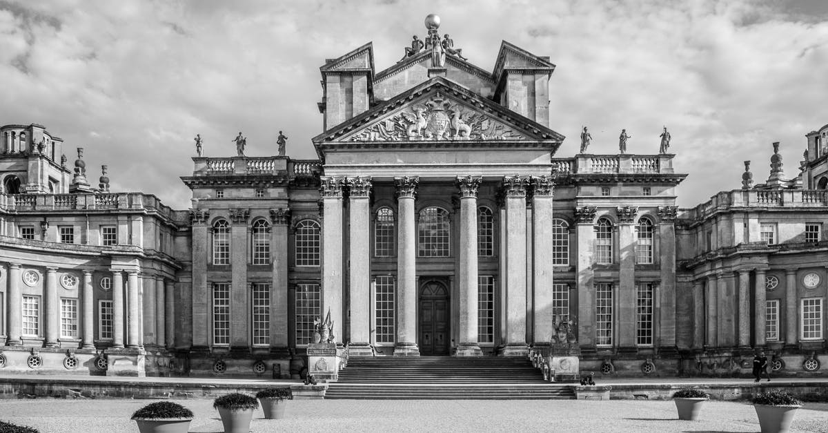 Visa for volunteering in England - Grayscale Photo of Concrete Building Visa for volunteering in England - Grayscale Photo of Concrete Building